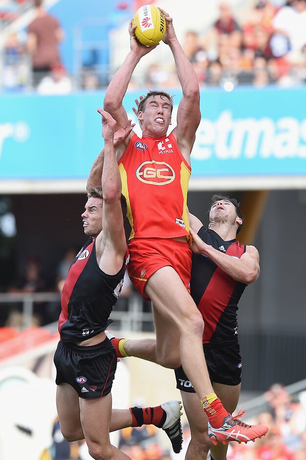 AFL 2016 Rd 01 - Gold Coast v Essendon Tom Lynch soars high for a big mark - ${keywords}